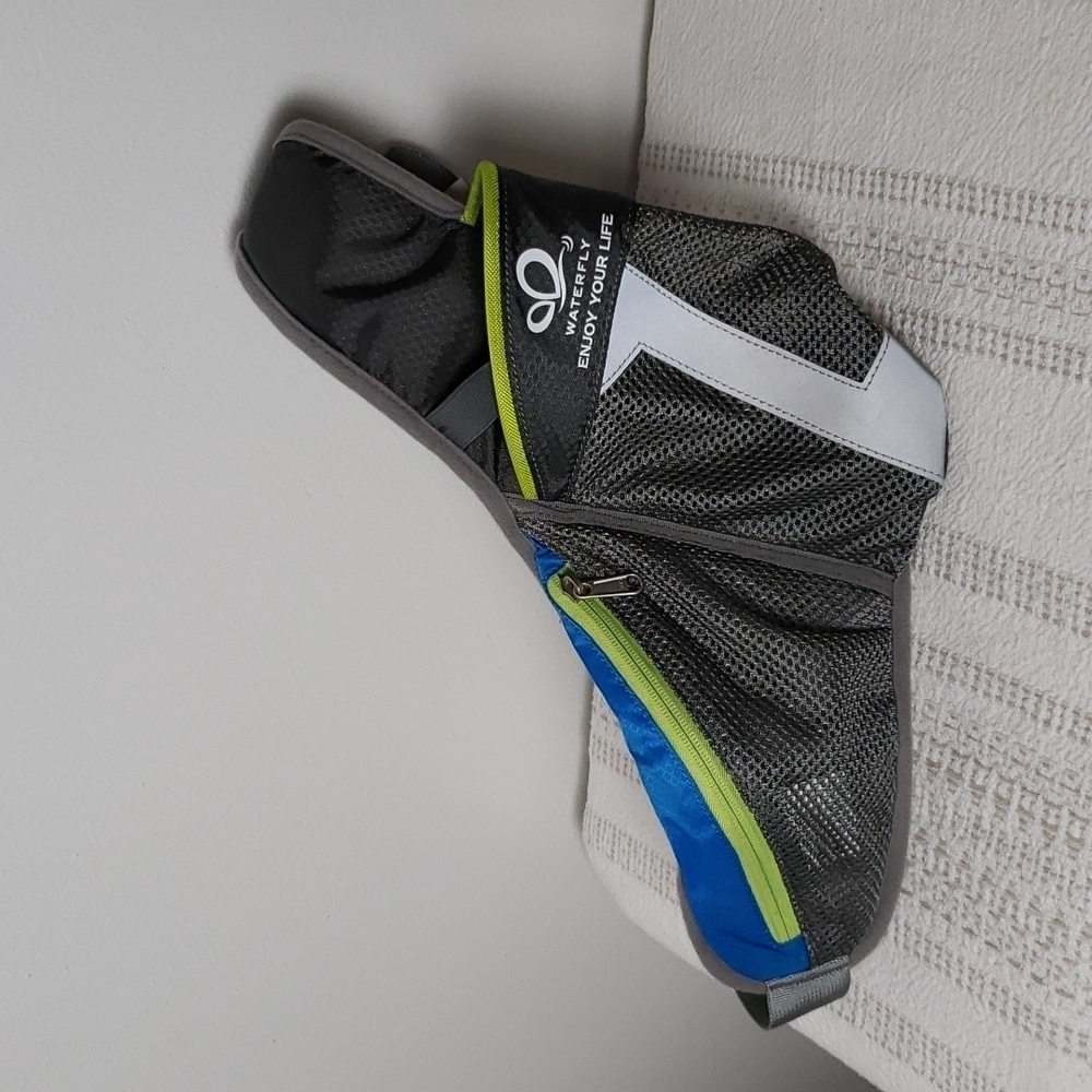 Waterfly fannypack, water bottle holder, runners walkers, athletic use.